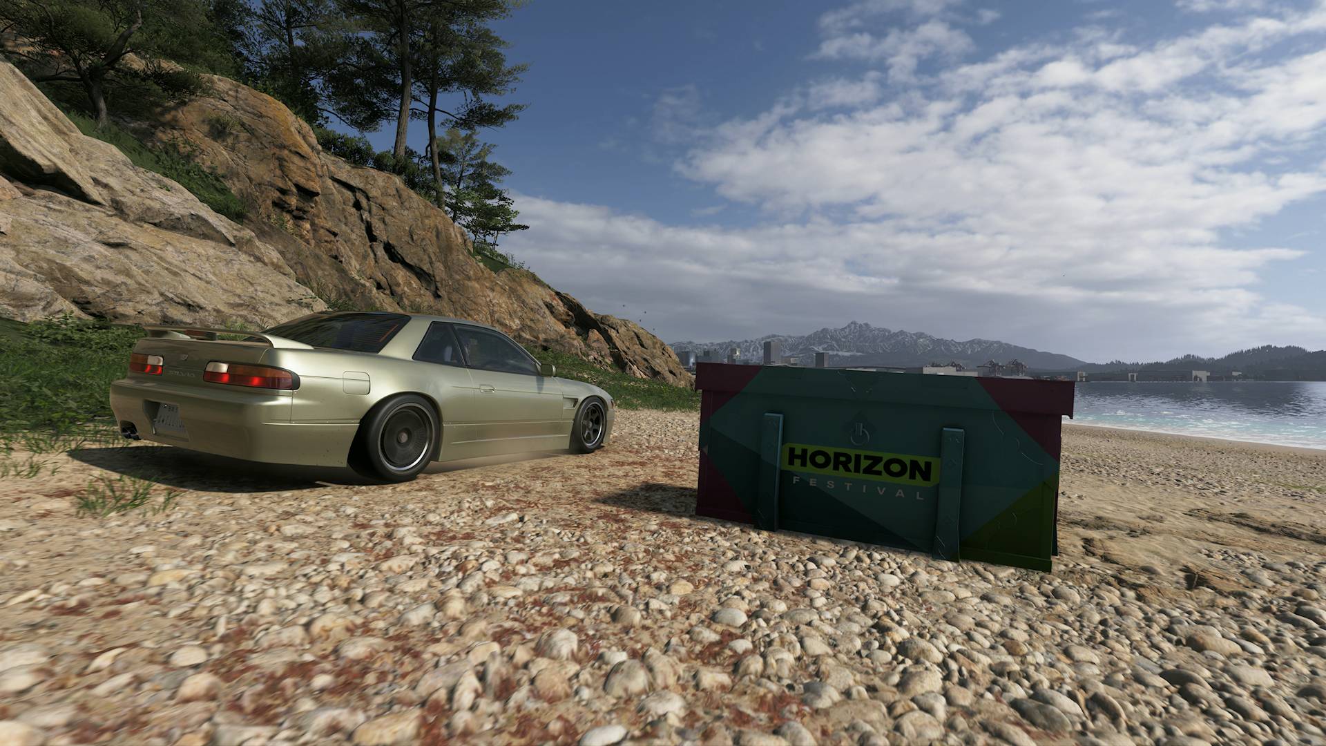 Forza Horizon 6 Nissan Silvia next to Treasure Hunt chest on a beach in the Nangan Region overlooking Tokyo City