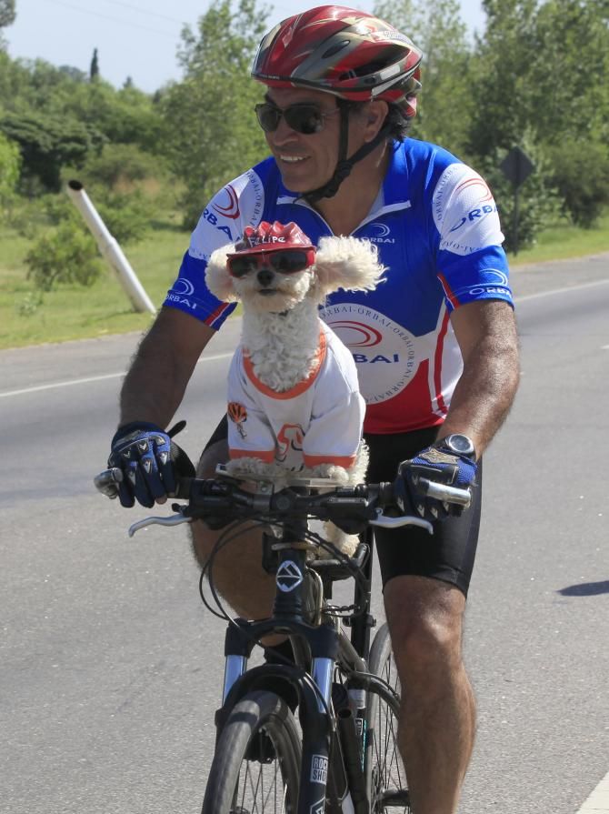 This fan and his dog were regular visitors at the Tour de San Luis
