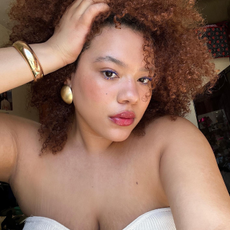 Girl with curly hair.