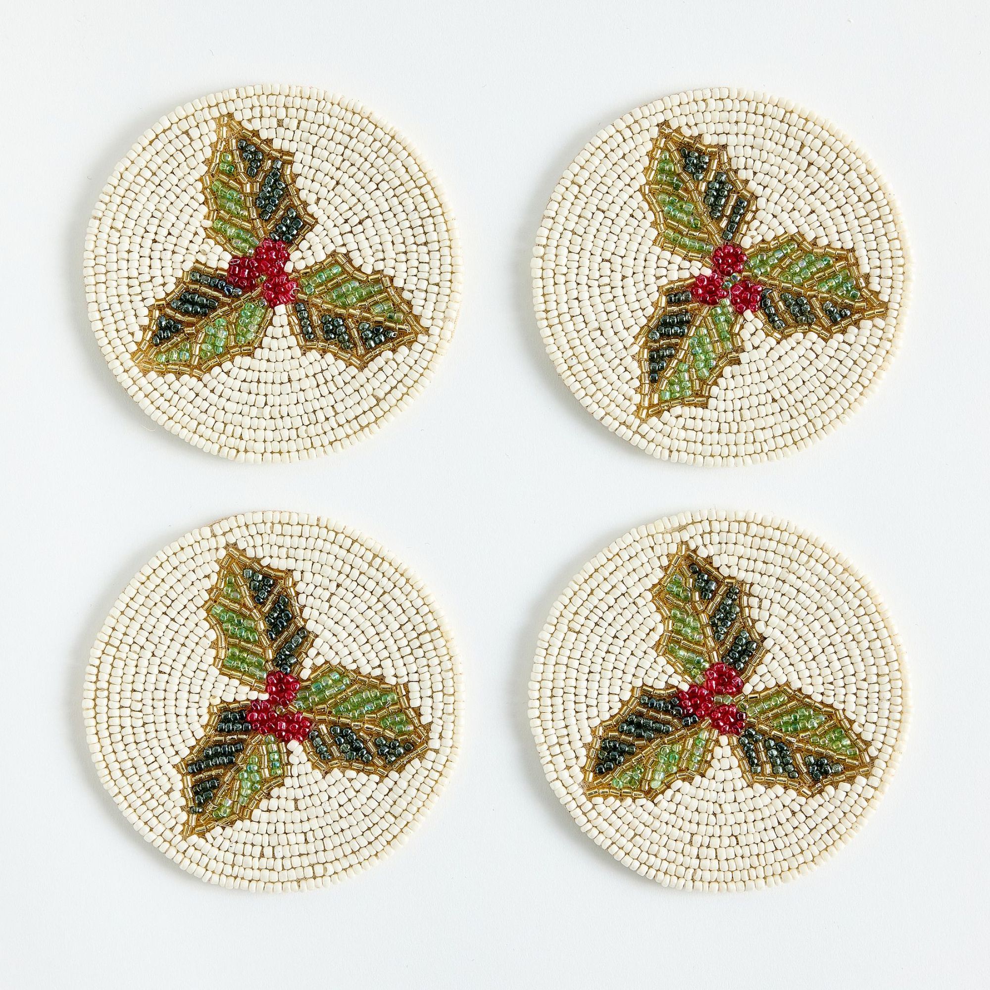 White beaded coasters with holly design