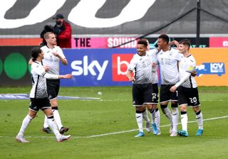 Morgan Whittaker (second right) is congratulated by his team-mates after scoring against Derby