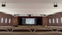 Two school auditoriums donned with new EM Acoustics loudspeakers. 