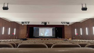 Two school auditoriums donned with new EM Acoustics loudspeakers.