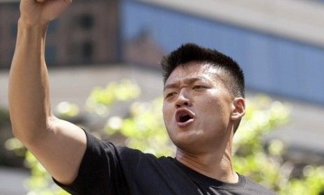 Dan Choi marches in a gay rights parade through San Francisco.