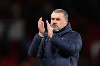 Tottenham Hotspur manager Ange Postecoglou acknowledges the fans following the Premier League match between Manchester United and Tottenham Hotspur at Old Trafford