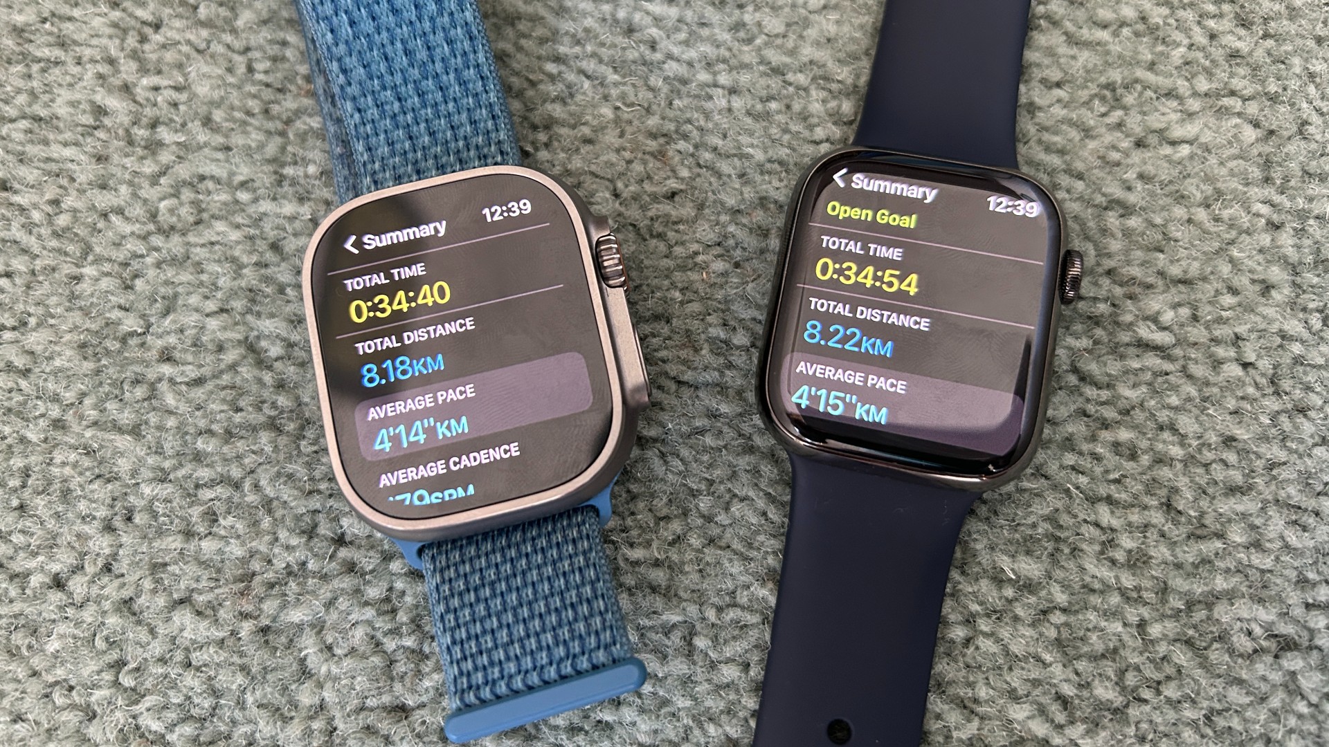 Apple Watch Ultra next to Apple Watch Series 8, both displaying post-run screens, the Series 8 displaying 14 more seconds and an extra 0.04km distance