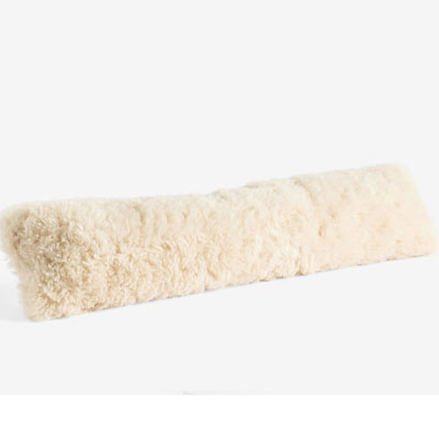 fluffy white shearling draught excluder
