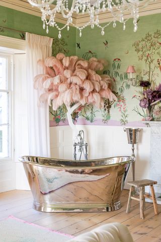 Bathroom with vintage chrome bath and chandelier