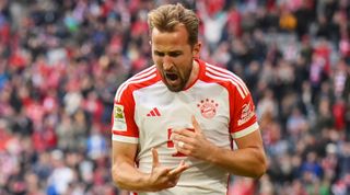 Harry Kane celebrates one of his three goals in an 8-0 win for Bayern Munich against Darmstadt in the Bundesliga in October 2023.