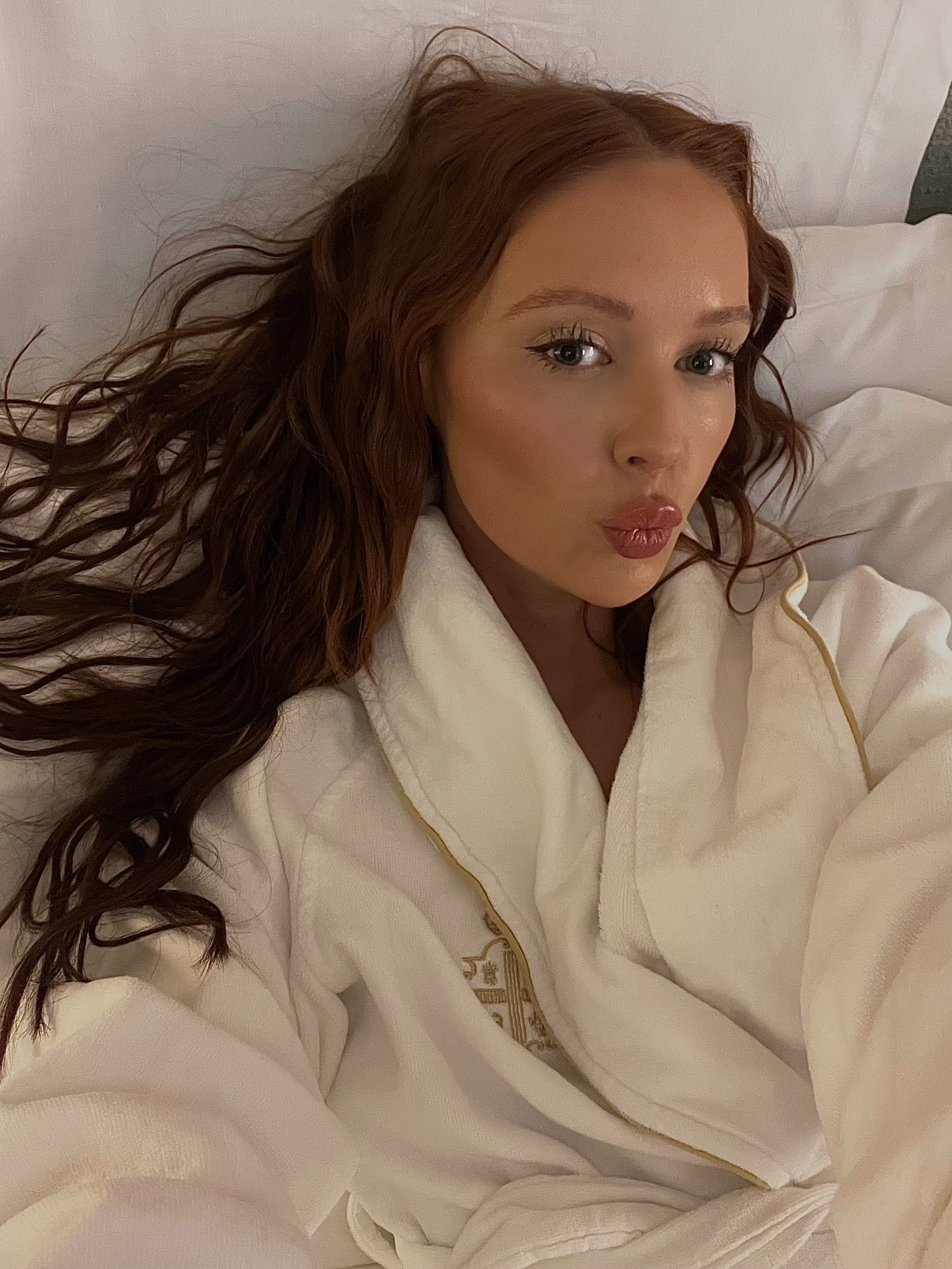 Erin Jahns wearing a white robe.