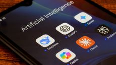 AI application symbols pictured on a smartphone screen, with ChatGPT, Claude, Copilot, Gemini, and DeepSeek included.