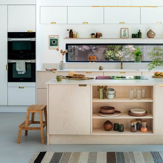 HUSK plywood kitchen with island and white wall units