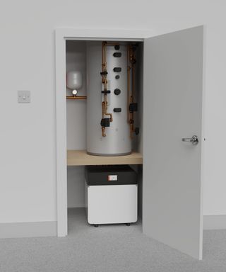 A Kensa ground source heat pump in a cupboard