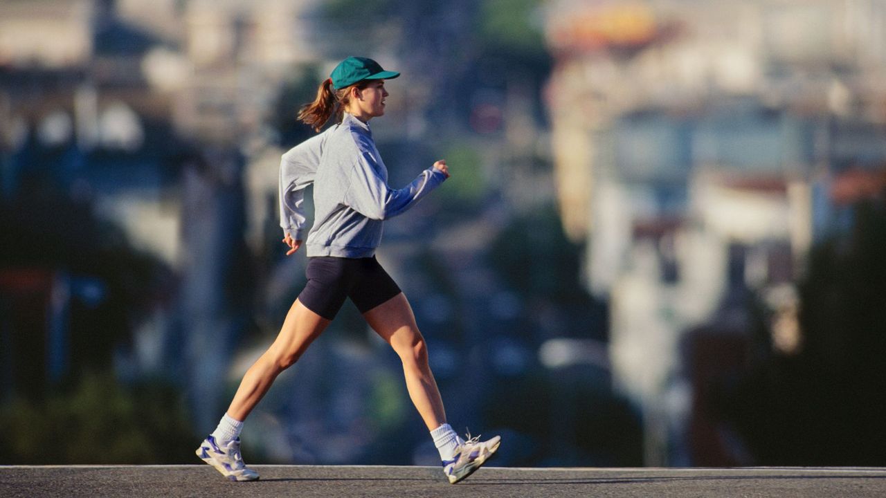 A woman doing one of the best 10 minute walking workouts