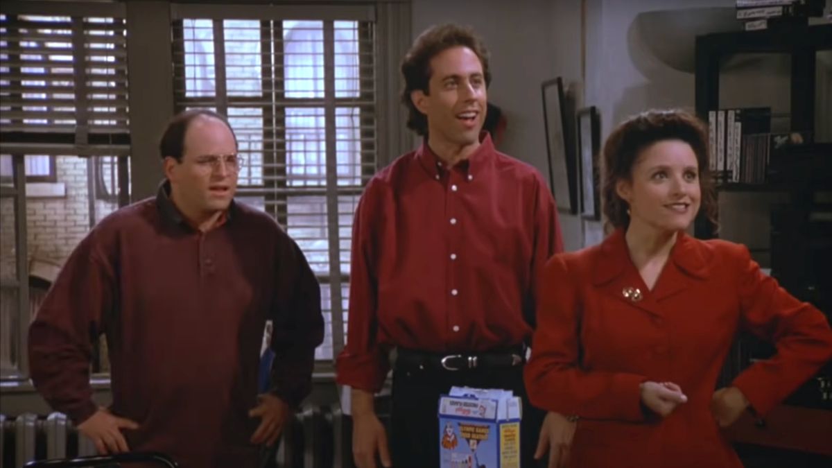 Jason Alexander Jerry Seinfeld and Julia Louis-Dreyfus stand in shock in Jerry&#039;s apartment in Seinfeld.