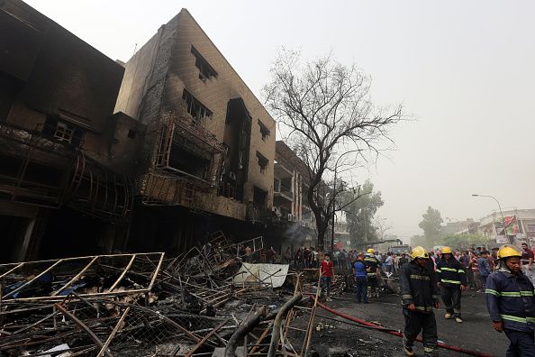 The site of a suicide bombing Sunday in Iraq.