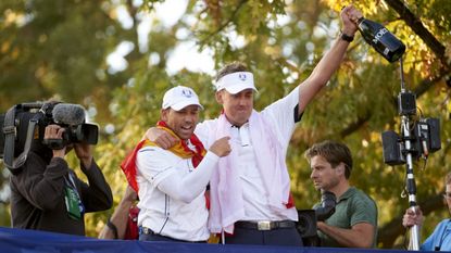 Ian Poulter and Sergio Garcia celebrate after winning the 2012 Ryder Cup at Medinah