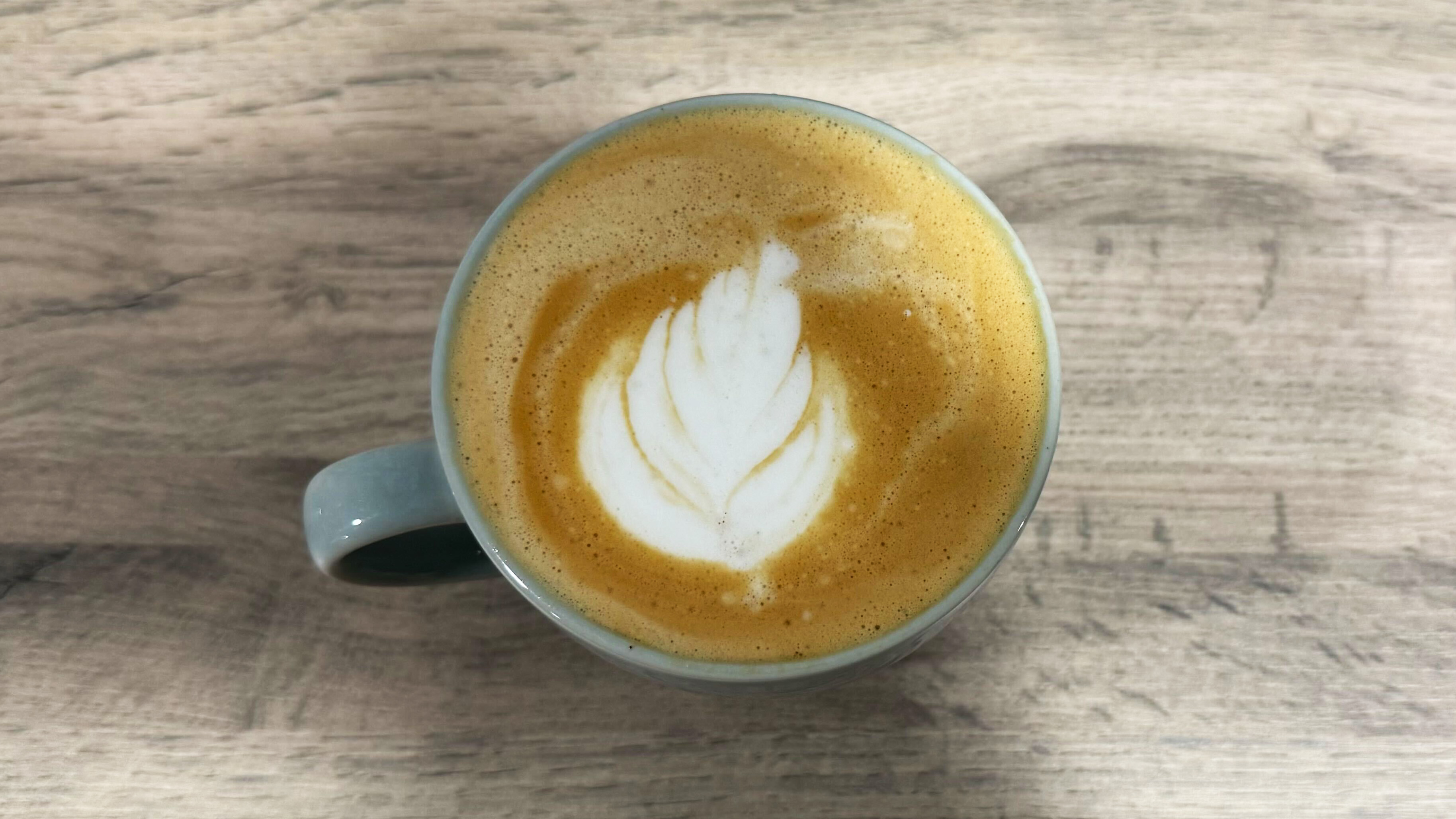 a photo of an espresso drink made on the casabrews cm5418 machine