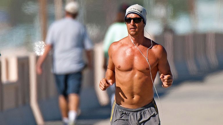 MALIBU, CA - JANUARY 23: Matthew McConaughey is seen jogging on the beach on January 23, 2011 in Malibu, California.