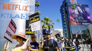  Actors in the SAG-AFTRA union join the already striking WGA union, film and tv writers on the picket line, on the first day of a SAG-AFTRA strike, in Los Angeles, CA, on July 14, 2023