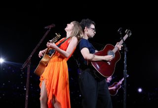 Taylor Swift and Jack Antonoff performing together on the Eras Tour in London