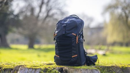 Cotton Carrier Hyker 25L Backpack in use outdoors on a sunny day