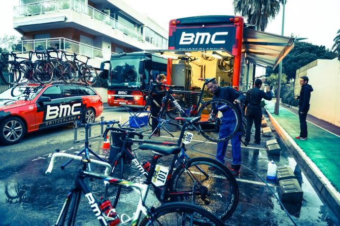 The BMC mechanics begin work on the riders' bikes