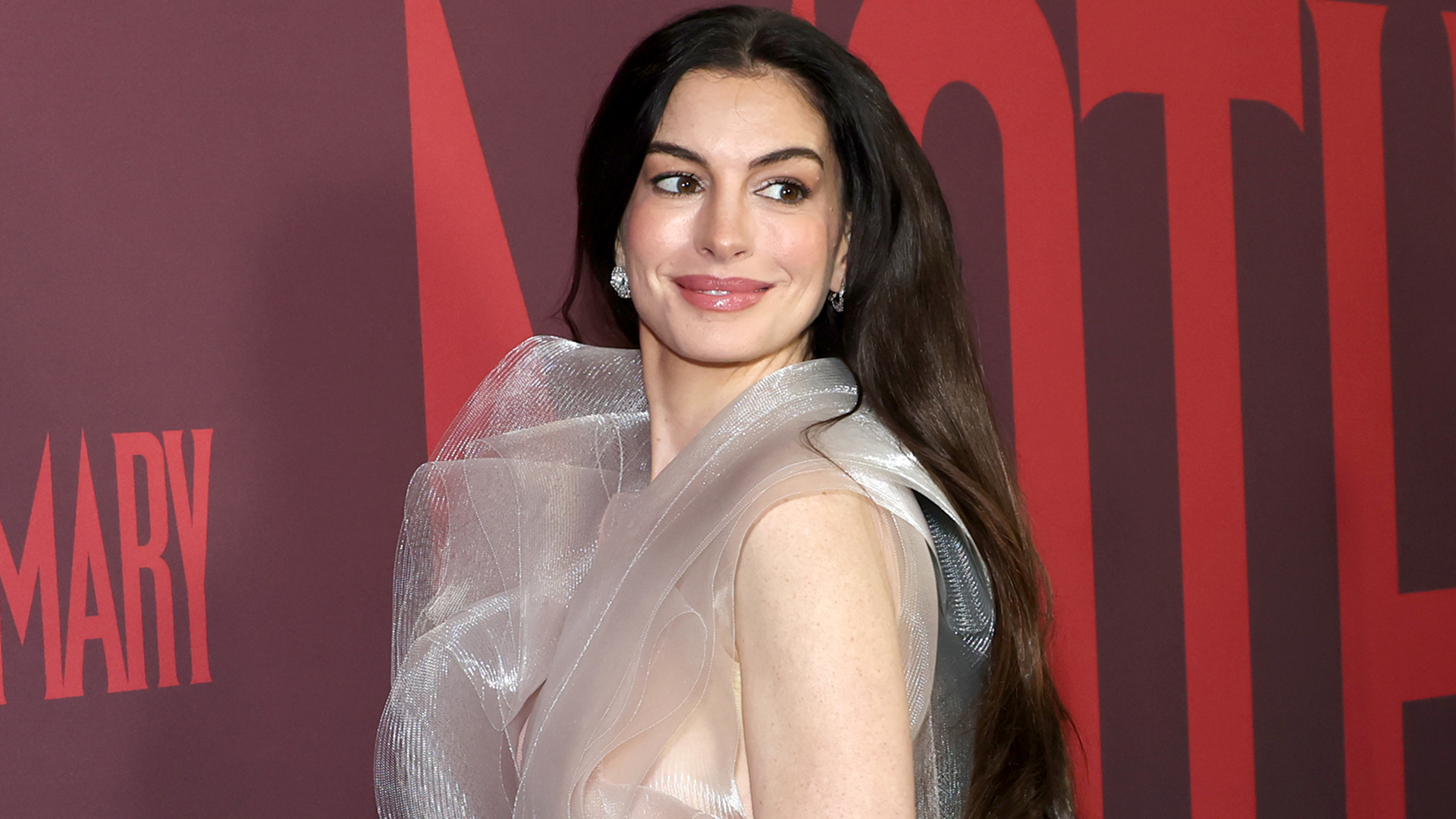 Anne Hathaway attended the Mother Mary premiere in NYC wearing a gaucy gown from Lever Couture