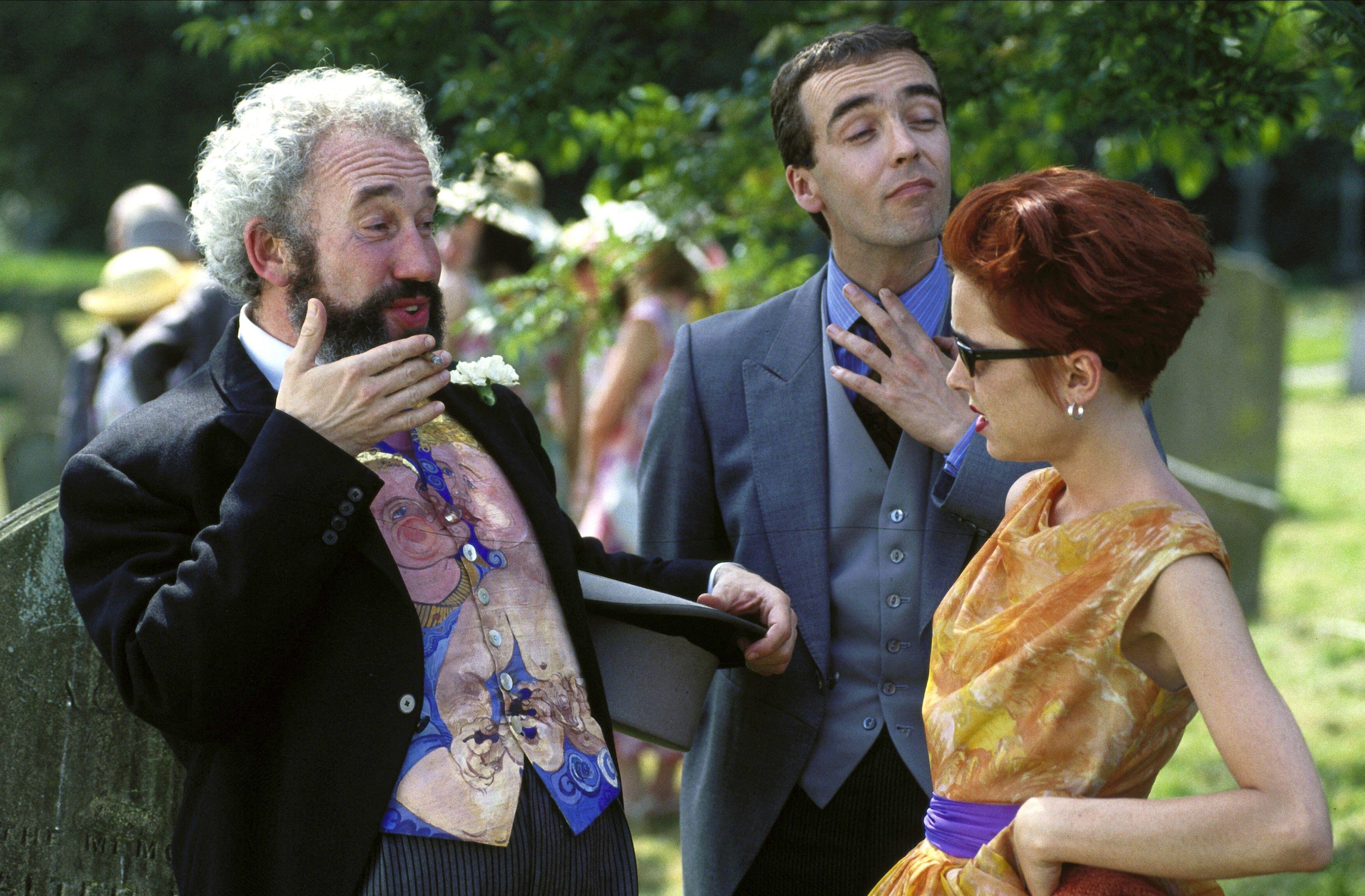 Simon Callow, John Hannah and Charlotte Coleman in Four Weddings And A Funeral