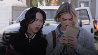 Ramona Young and Chelsea Frei reacting to a mass of Man Mitts being pulled from a clogged sewer in The Paper