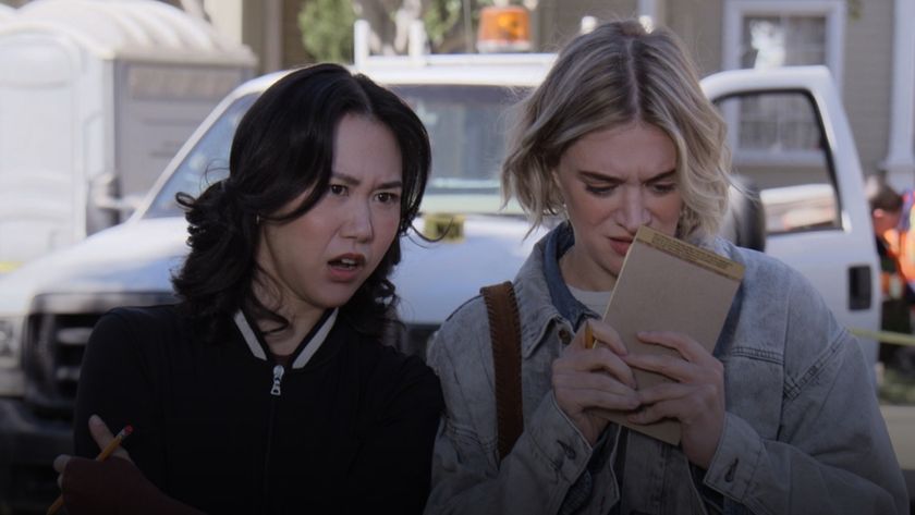 Ramona Young and Chelsea Frei reacting to a mass of Man Mitts being pulled from a clogged sewer in The Paper