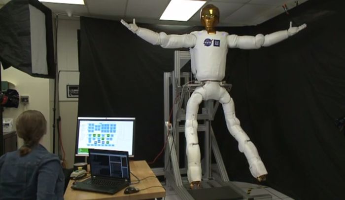 NASA&#039;s Robonaut 2 flexes its newly built legs in this still from a video demonstration of the robot&#039;s new capabilities released Dec. 9, 2013.