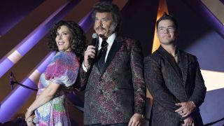 Judy (Edi Patterson), Jesse (Danny McBride) and Kelvin (Adam DeVine) address their congregation on The Righteous Gemstones.