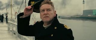 Dunkirk Kenneth Branagh looks up at the incoming air attack from the docks