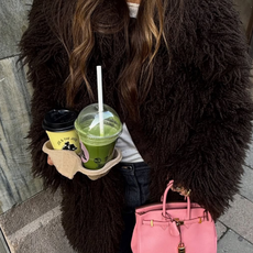 woman wearing fluffy winter coat 2025