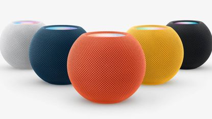 Apple HomePod smart speakers in red, yellow, blue and white