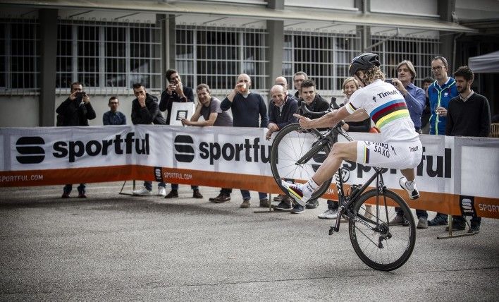 Peter Sagan pulls off a no-footed wheelie in front of an admiring crowd