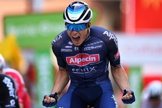 ALBACETE SPAIN AUGUST 18 Jasper Philipsen of Belgium and Team AlpecinFenix celebrates at finish line as stage winner during the 76th Tour of Spain 2021 Stage 5 a 1844km stage from Tarancn to Albacete lavuelta LaVuelta21 on August 18 2021 in Albacete Spain Photo by Stuart FranklinGetty Images