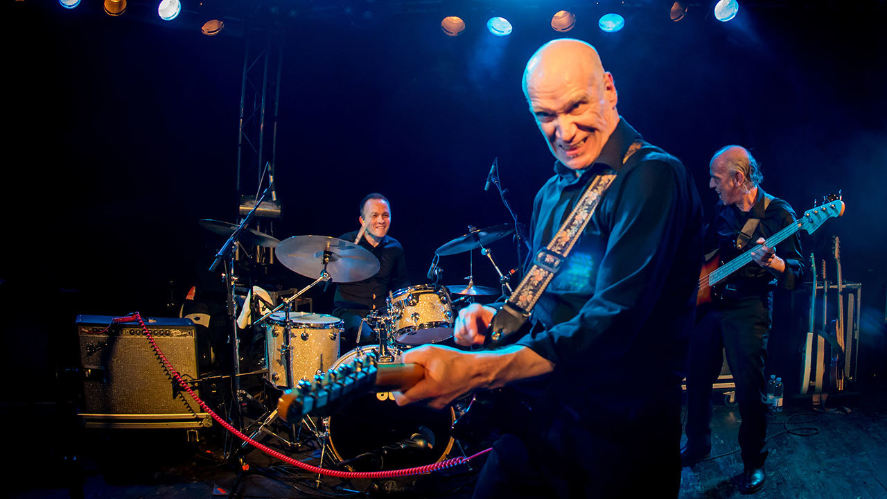 A shot of Wilko Johnson on stage