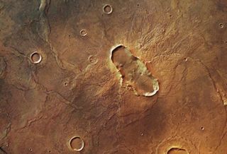 An elliptical crater in the Hesperia Planum region of Mars, captured by the European Space Agency's Mars Express.