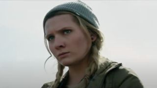 Abigail Breslin looks concerned in a field in Zombieland: Double Tap.