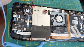 Upgrading Steam Deck SSD: Unscrew the three screws.