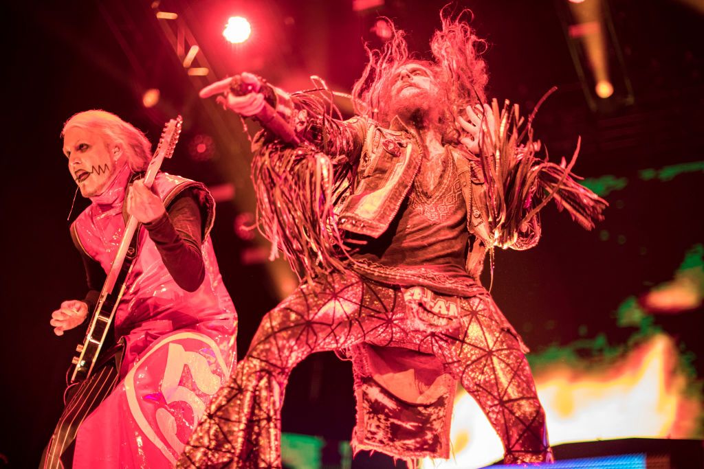 A picture of John 5 performing alongside Rob Zombie