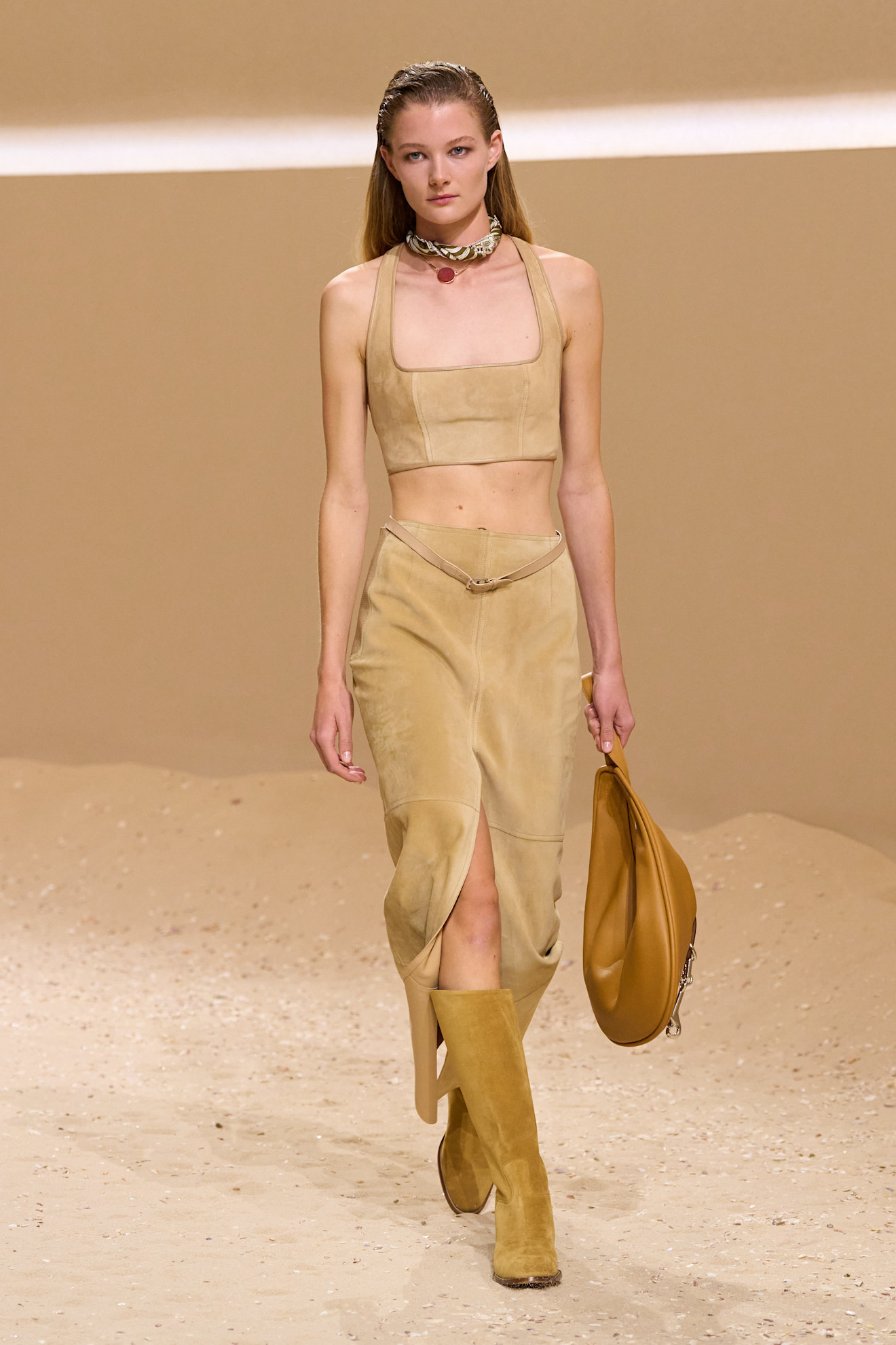 A model walks the hermes spring 2026 runway show in paris.