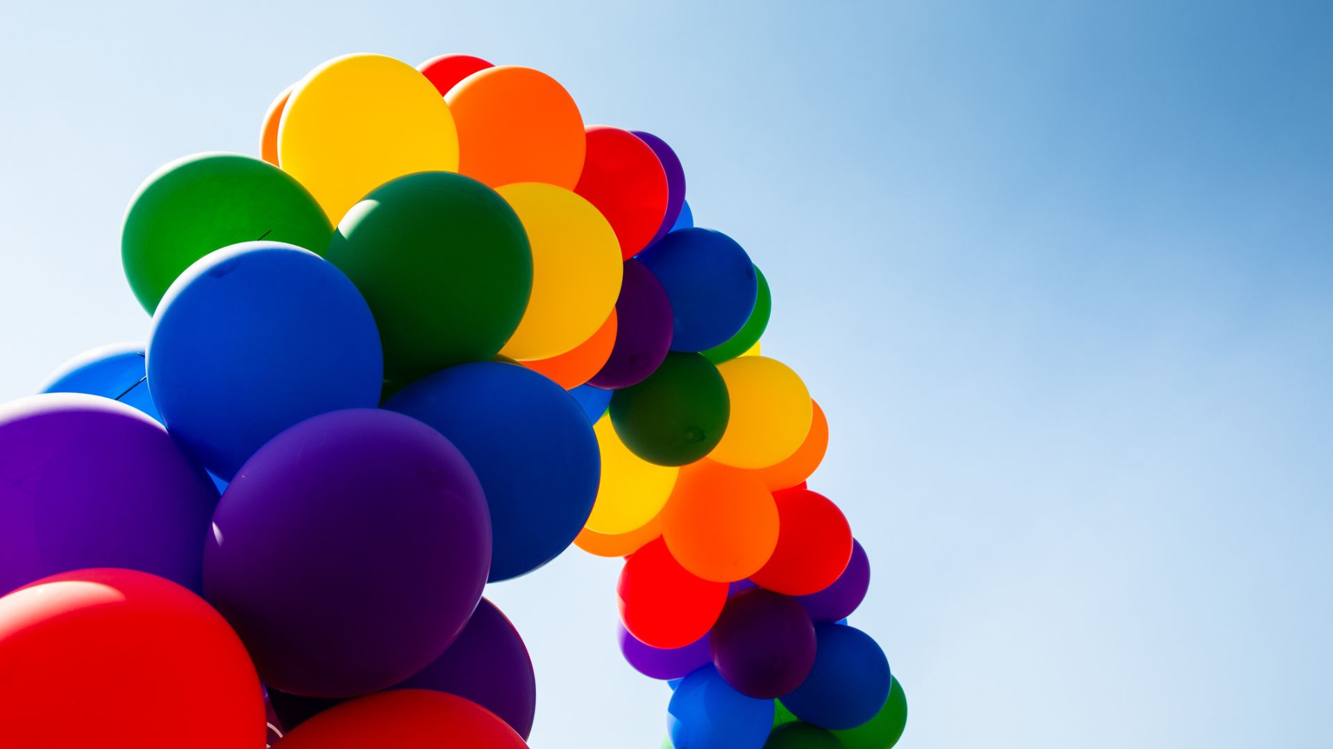 A rainbow balloon arch