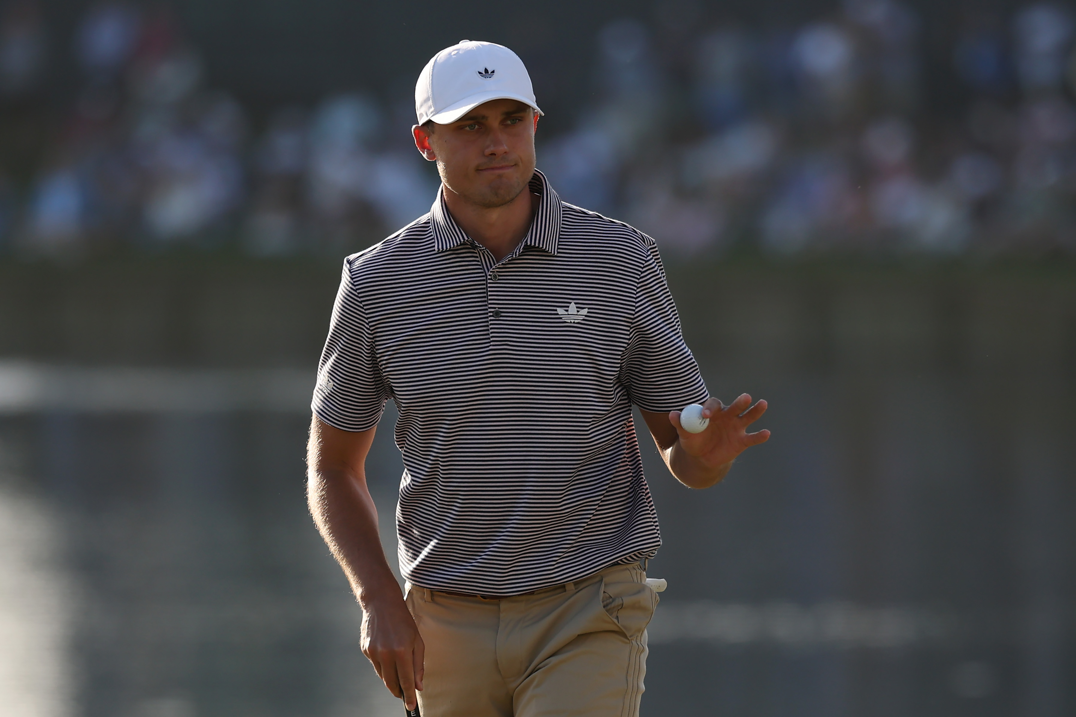 Ludvig Aberg waves to the crowd