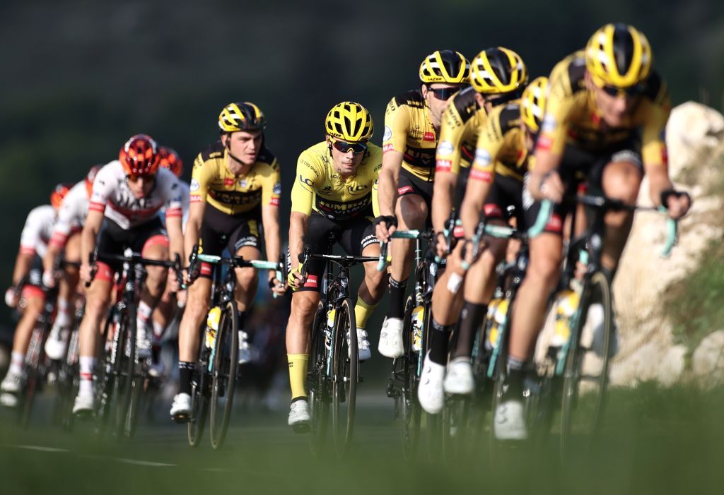 Team Jumbo rider Slovenias Primoz Roglic C wearing the overall leaders yellow jersey rides during the 16th stage of the 107th edition of the Tour de France cycling race 164 km between La Tour du Pin and VillarddeLans on September 15 2020 Photo by KENZO TRIBOUILLARD AFP Photo by KENZO TRIBOUILLARDAFP via Getty Images