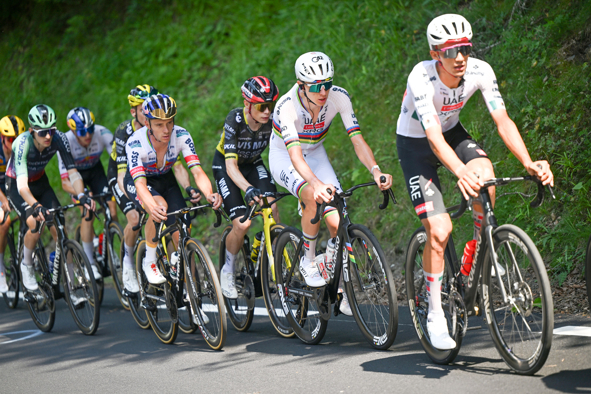 GAVARNIE-GEDRE, FRANCE - JULY 09: (EDITOR'S NOTE: Tonal effects have been applied to this image) (L-R) Remco Evenepoel of Belgium and Team Red Bull - BORA - hansgrohe, Jonas Vingegaard of Denmark and Team Visma | Lease a Bike and Tadej Pogacar of Slovenia and UAE Team Emirates - XRG compete during the 113th Tour de France 2026, Stage 6 a 186.2km stage from Pau to Gavarnie-Gedre 1379m / #UCIWT / on July 09, 2026 in Gavarnie-Gedre, France. (Photo by Dario Belingheri/Getty Images)