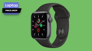 Apple Watch SE smartwatch with black sport band 