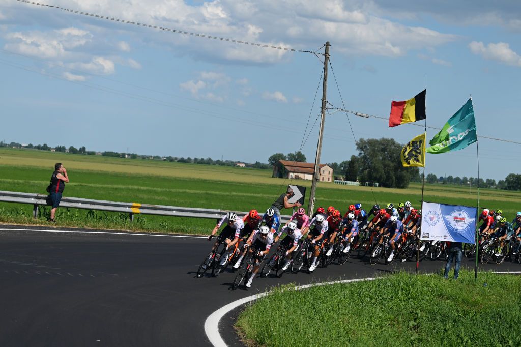 CENTO ITALY MAY 17 LR Domen Novak of Slovenia and UAE Team Emirates Connor Swift of The United Kingdom and Team INEOS Grenadiers Felix Grobschartner of Austria and UAE Team Emirates Pieter Serry of Belgium and Team Soudal QuickStep Tadej Pogacar of Slovenia and UAE Team Emirates Pink Leader Jersey Tobias Foss of Norway and Team INEOS Grenadiers lead the peloton during the 107th Giro dItalia 2024 Stage 13 a 179km stage from Riccione to Cento UCIWT on May 17 2024 in Cento Italy Photo by Dario BelingheriGetty Images